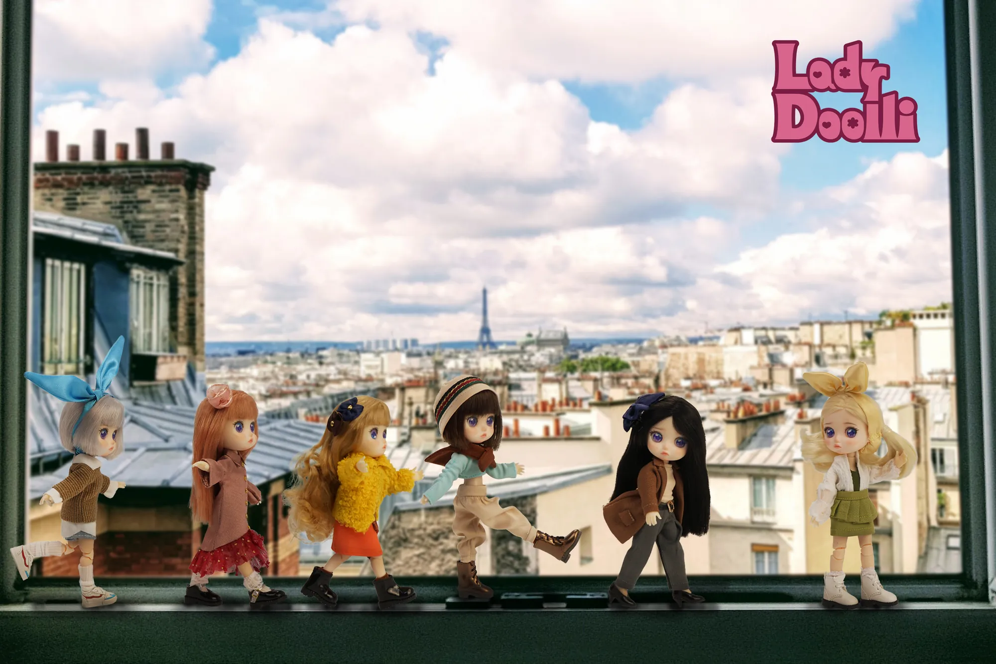 Six Doollis lined up on a windowsill with the Eiffel Tower behind them